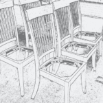 Wooden chairs without seats in a row.