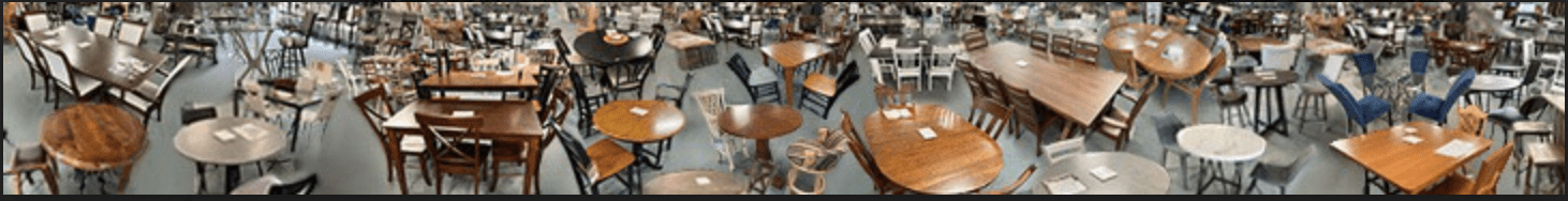 A furniture store showroom with various wooden tables and chairs.